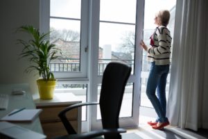 Woman standing at home